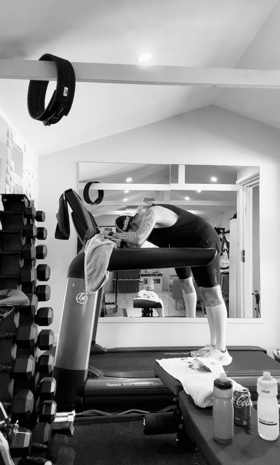 Phillipe collapsed over the treadmill handrails after finishing the marathon